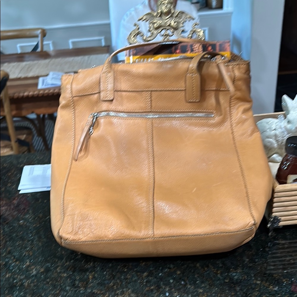 A beautiful natural tan shoulder bag